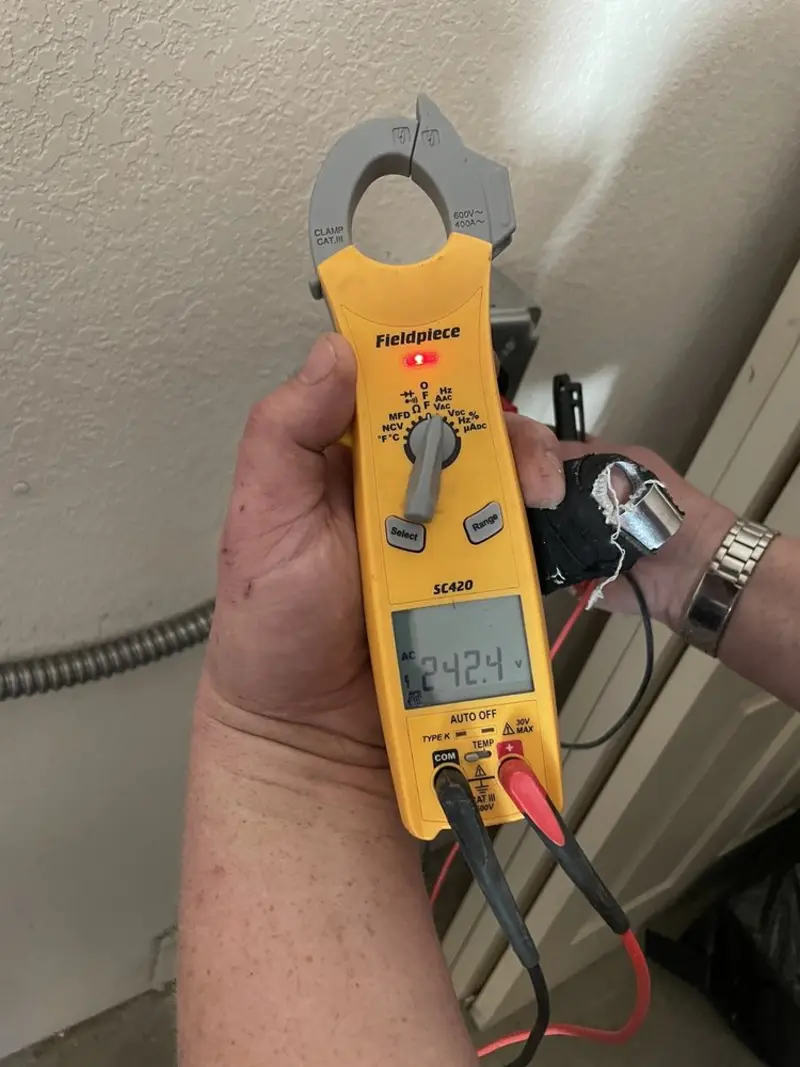 Voltage testing with clamp meter during Hot Tub / Pool Electrical Wiring in Meridian